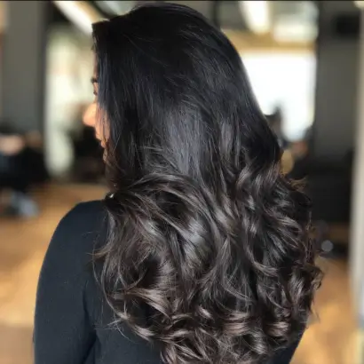 Glossy Black Barrel Curls
